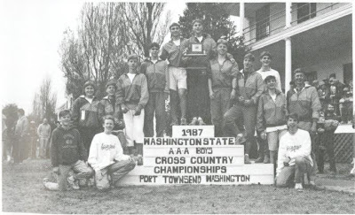 xc-1987-boys-team-on-state-podium-yearbook